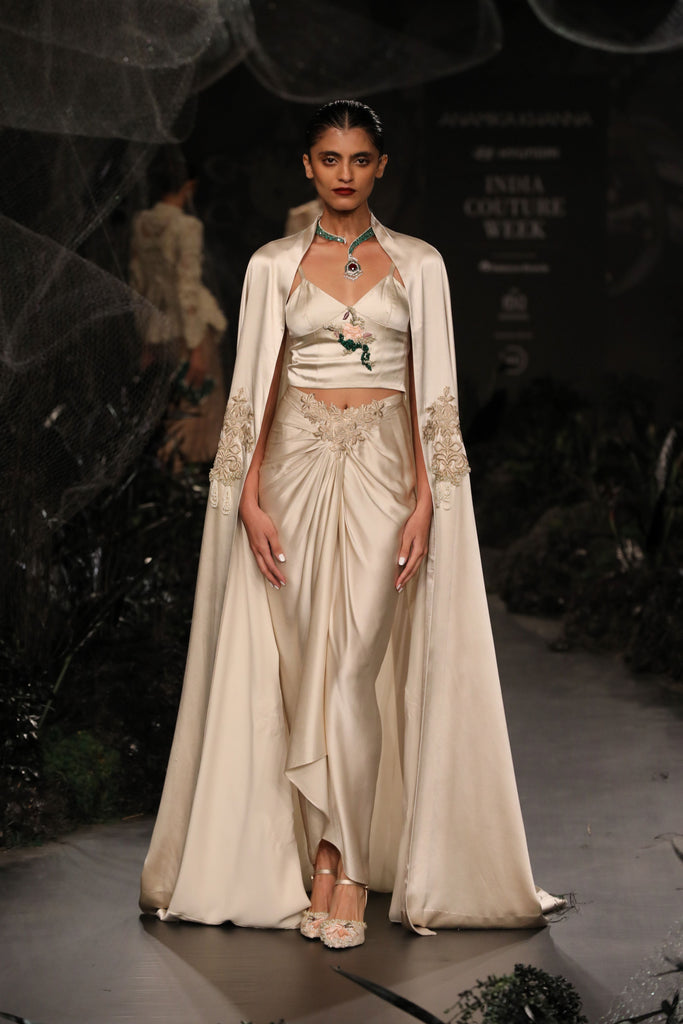 Cape with gold applique with draped skirt